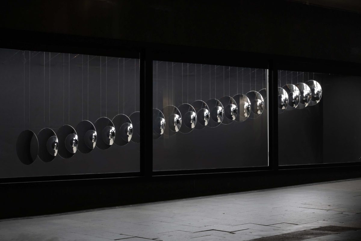 Kinetic sculpture created with 20 surveillance mirrors by SpY